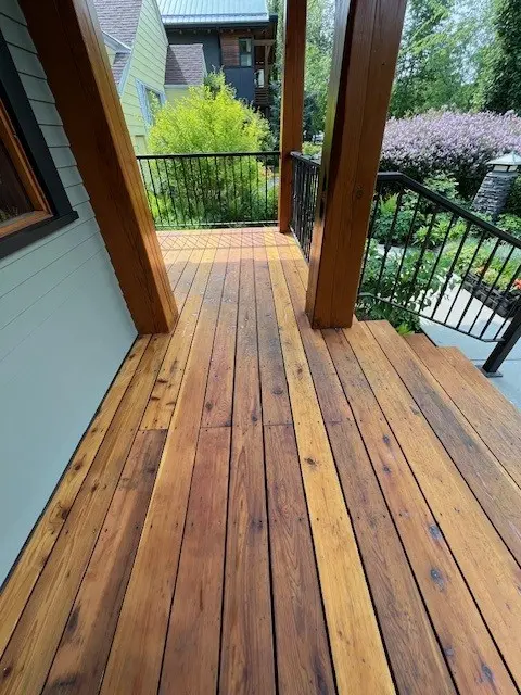 Professionally stained cedar deck and wood porch completed by Dynamic Painting in Calgary