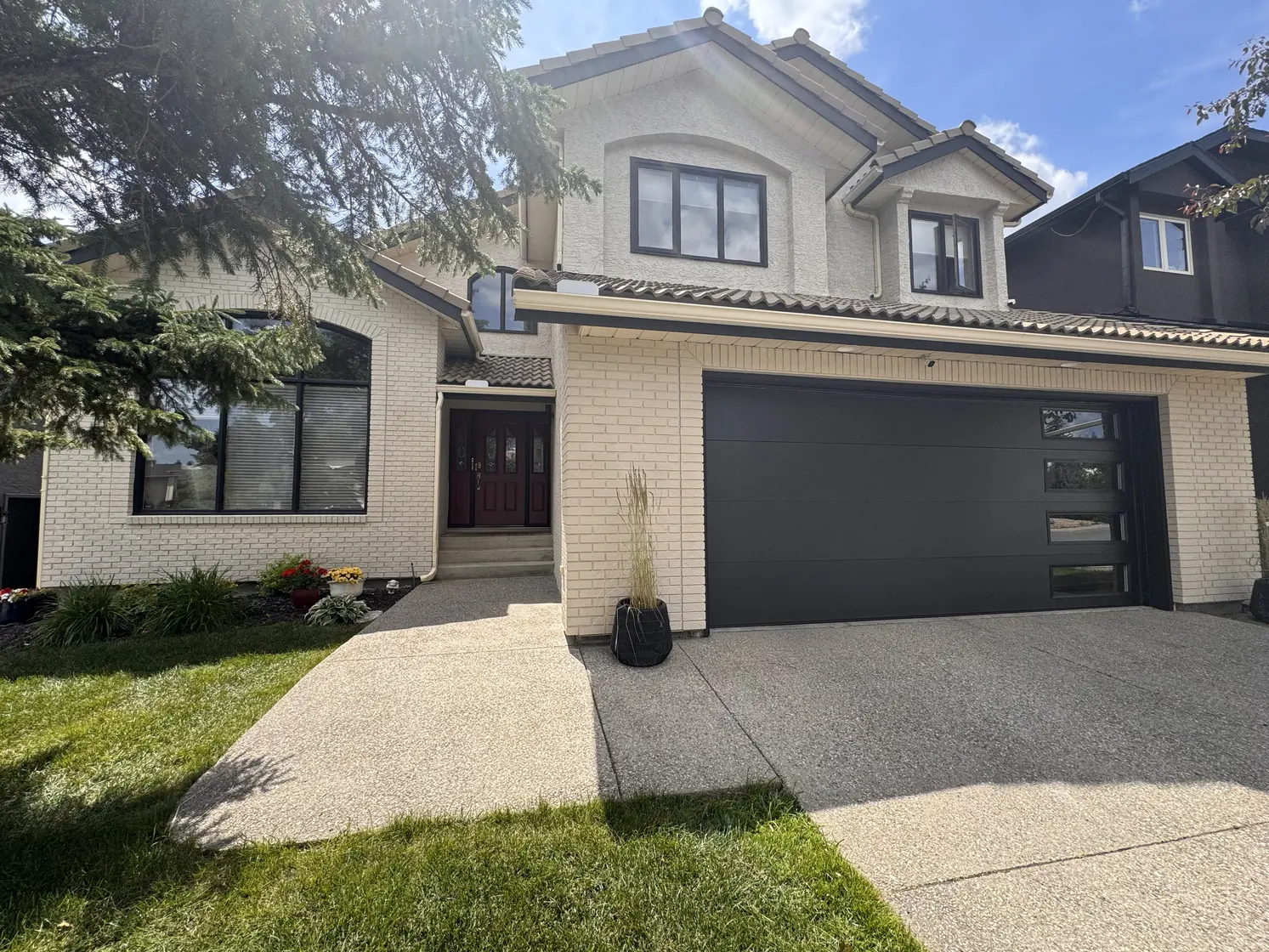 Calgary home exterior prepared and painted by Dynamic Painting