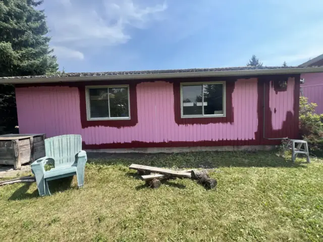 Calgary bungalow exterior painting colour change in progress