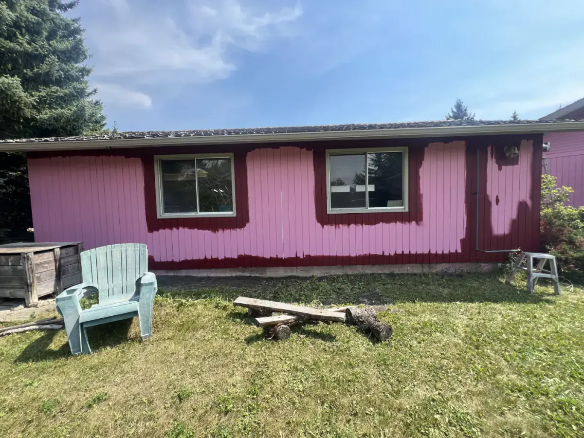 Calgary bungalow exterior painting colour change in progress