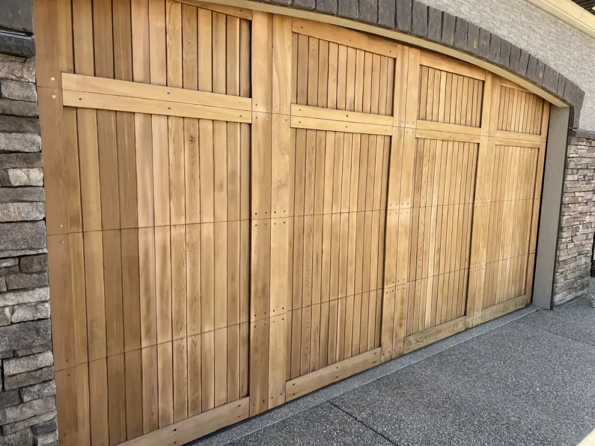 Cedar garage door after sanding and preparation before final refinishing by Dynamic Painting
