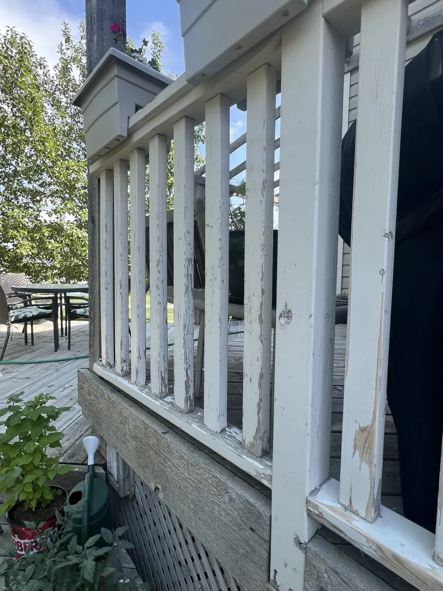 Weathered exterior railing before refinishing by Dynamic Painting