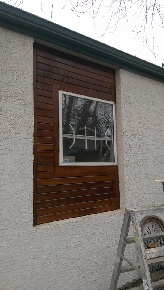 Refinished cedar exterior accent surrounding a large window